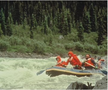 A group of people rafting at the Bonnet Plume River, Yukon